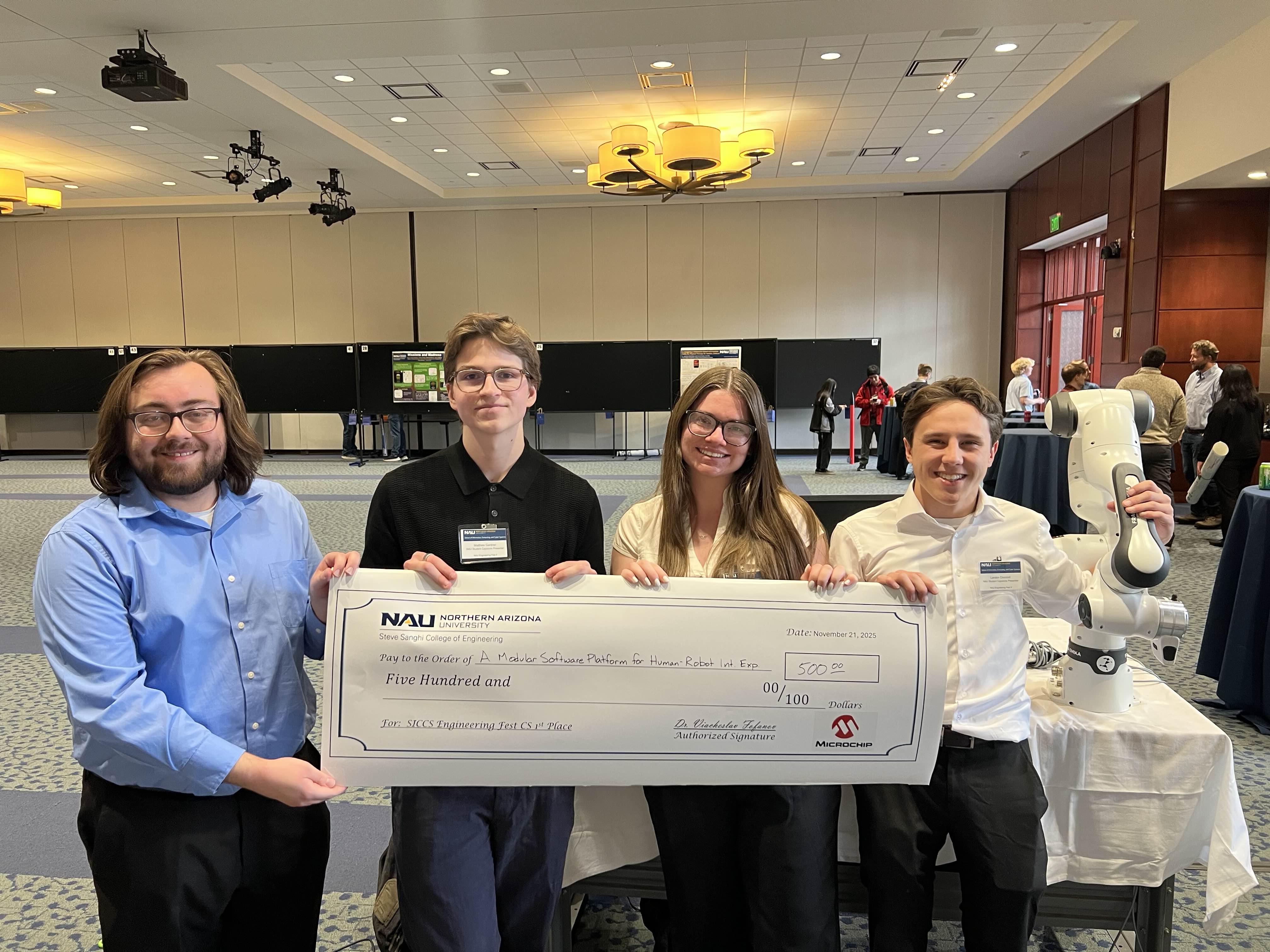 Team Holding First Place Award